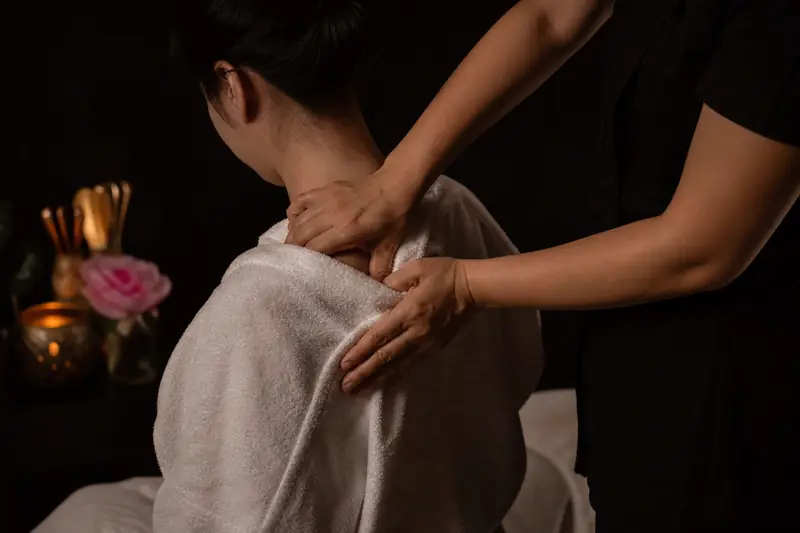 Deep tissue pressure on the shoulder and neck